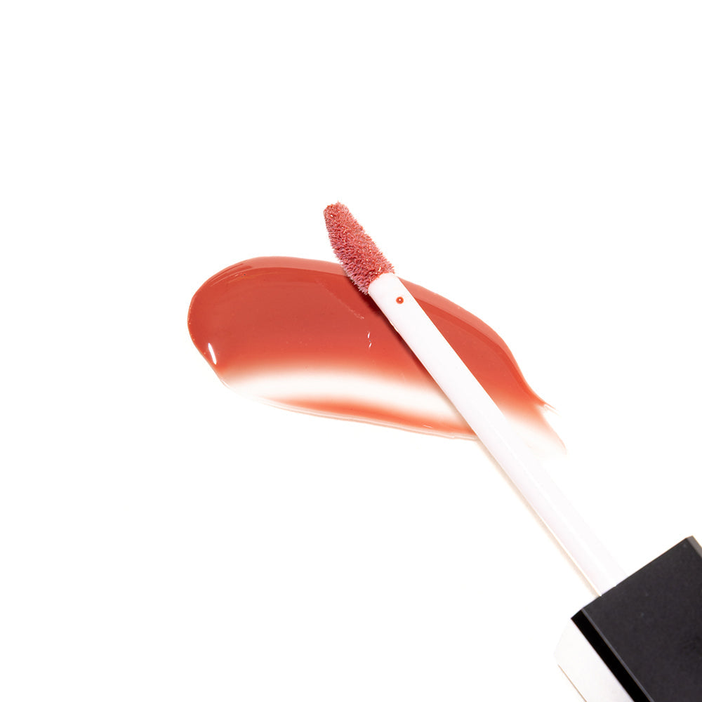 Brillo voluminizador labial con feromonas